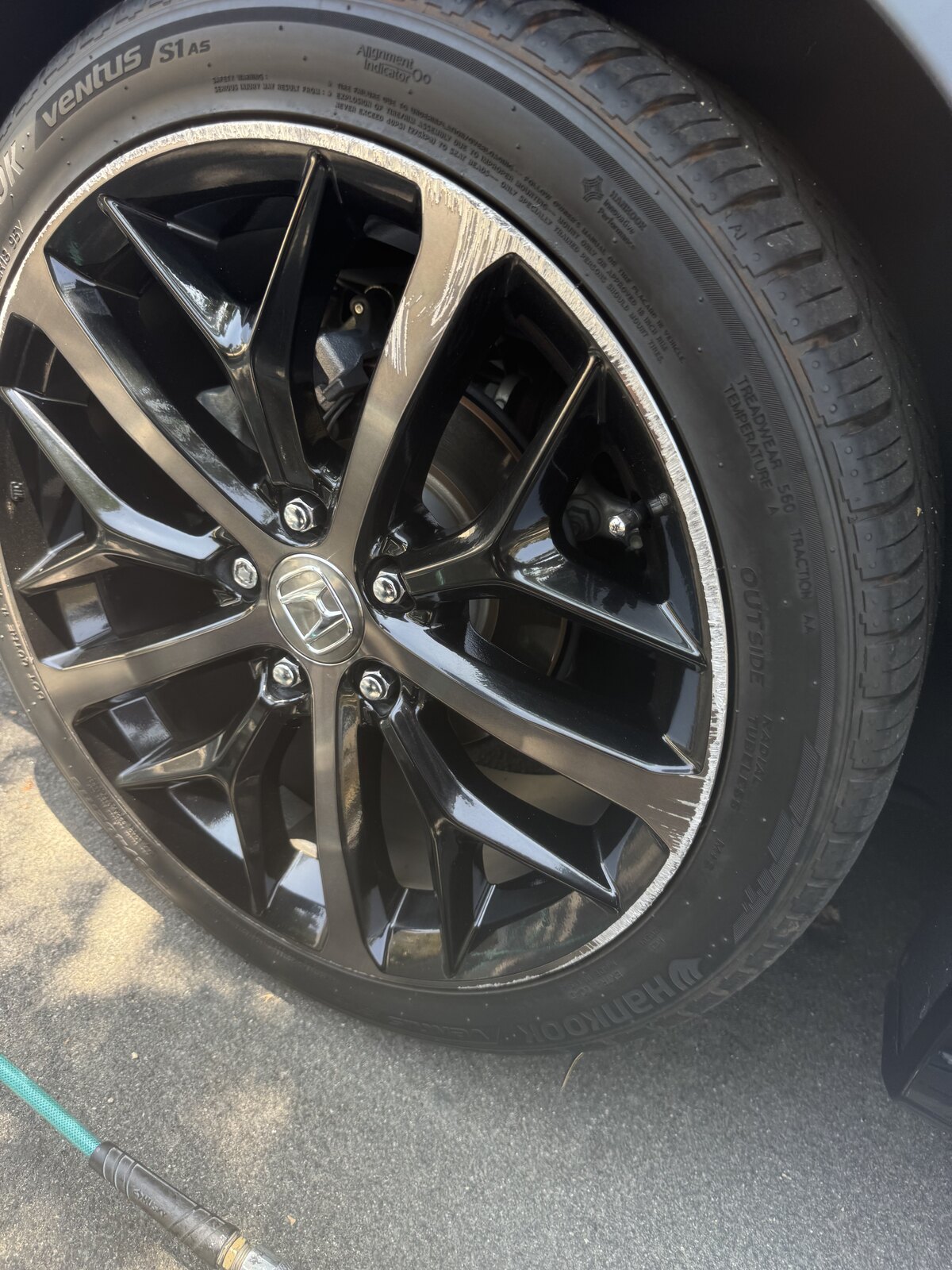 Honda Civic Si wheel after professional curb rash repair in Los Angeles